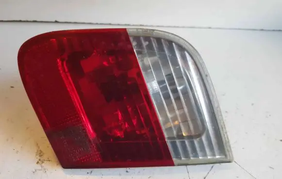 Tail light bulb cover holder