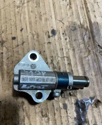 Volkswagen PASSAT B6 Timing belt/chain tensioner 06h109467