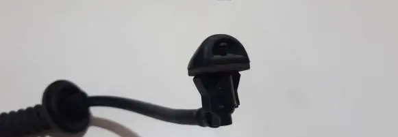 Headlight washer spray nozzle
