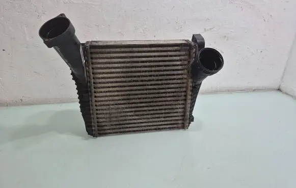 Volkswagen Touareg I Intercooler radiator 7L6145803