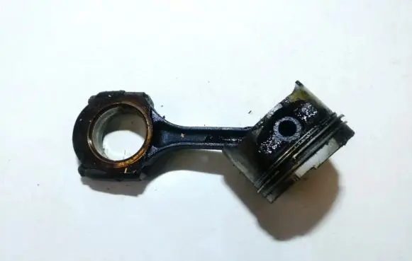 Piston with connecting rod