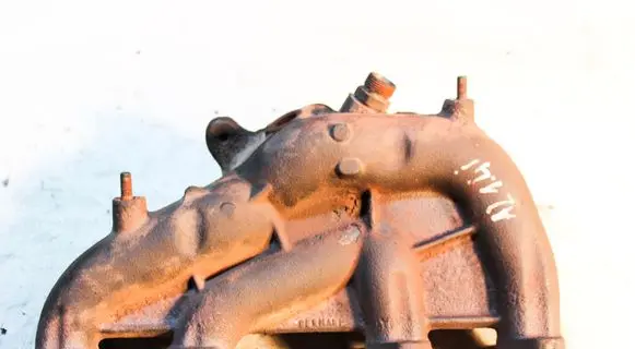 Audi A2 Exhaust manifold 06A253033P