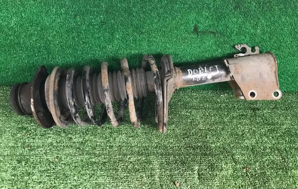 Front shock absorber with coil spring