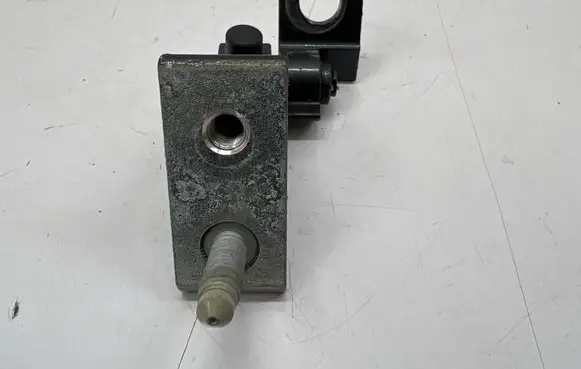 Front door lower hinge