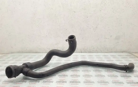 Volkswagen PASSAT B5 Engine coolant pipe/hose 8D0121055F