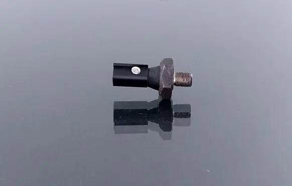 Volkswagen PASSAT B5 Oil pressure sensor 06A919081 06A919081A
