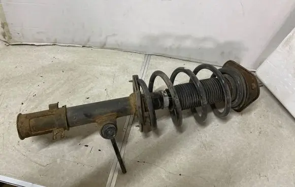 SsangYong Korando Front shock absorber with coil spring 4432034000