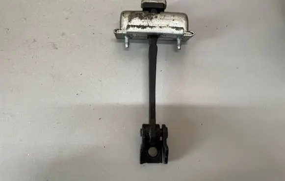 Opel Corsa E Rear door check strap stopper