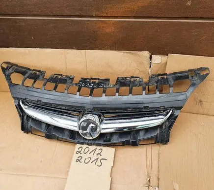 Opel Astra J Front bumper upper radiator grill 13368851