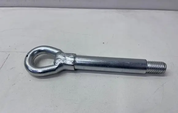 Towing hook eye