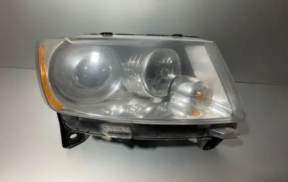 Jeep Grand Cherokee Headlight/headlamp 55079380AE 315021 M149686