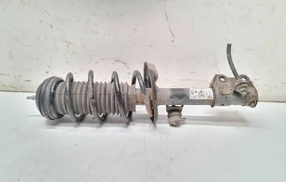 Opel Corsa D Front shock absorber with coil spring 13214357 CP273 FRDNT1008