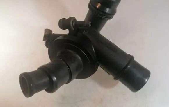 Thermostat/thermostat housing