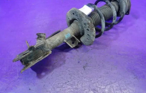 Renault Koleos I Front shock absorber with coil spring