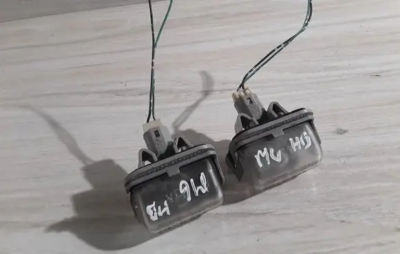 Mazda 6 Number plate light 13061971
