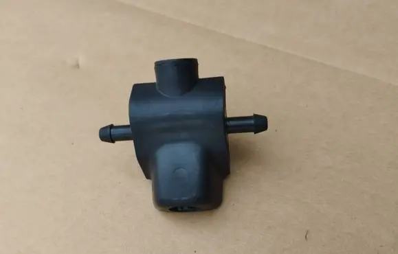 Windshield washer spray nozzle