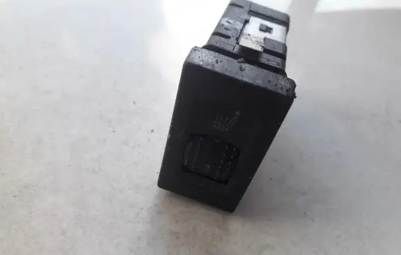 Seat heating switch