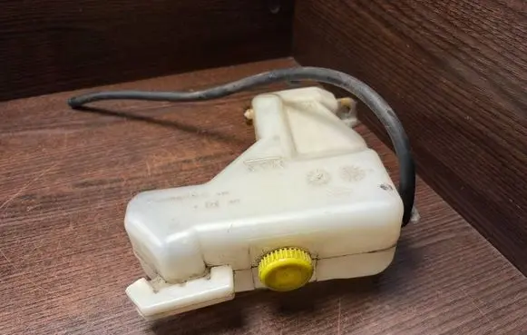 Nissan Primera Coolant expansion tank/reservoir 21710BM410