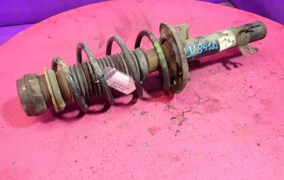 Front shock absorber with coil spring