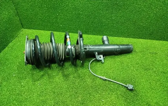 Renault Espace V (RFC) Front shock absorber with coil spring 543022288R 2005559 E4657601