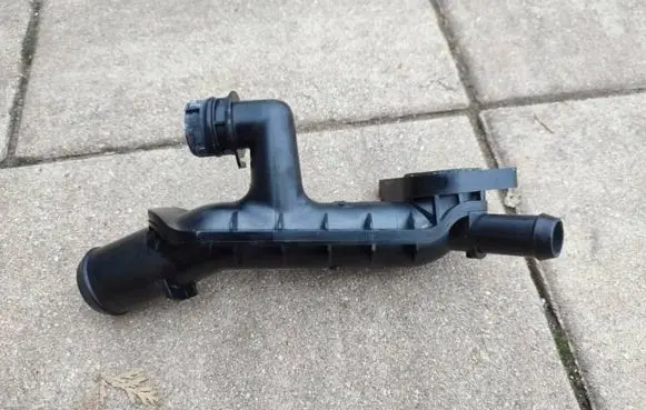 Thermostat/thermostat housing