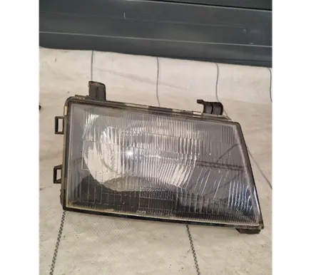 Mitsubishi Pajero Sport I Headlight/headlamp 11087351