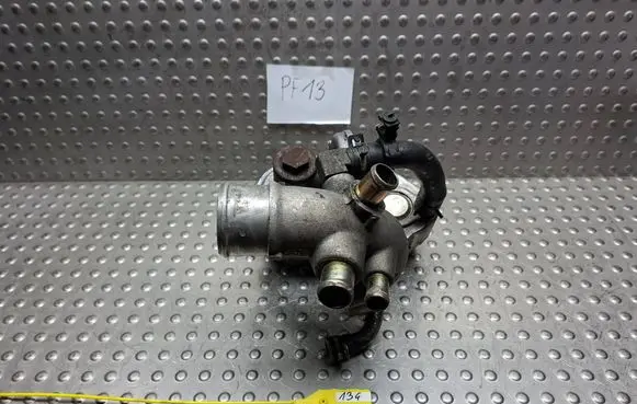 Jeep Grand Cherokee (WJ) Oil filter mounting bracket S18046119 90112116F