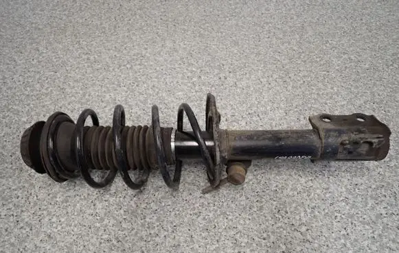 Toyota Yaris Front shock absorber with coil spring