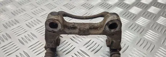 Volkswagen PASSAT B6 Brake caliper pad carrier rear 