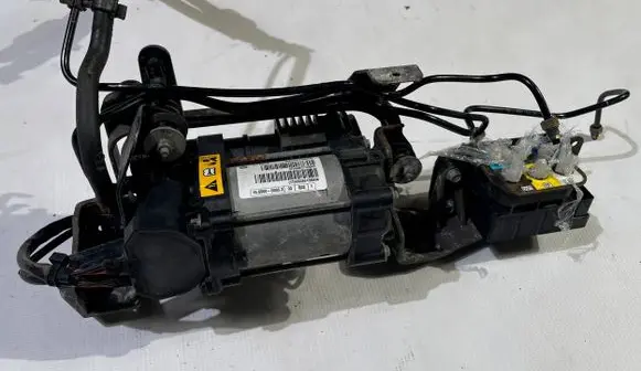 Dodge RAM 1500 DS Air suspension compressor/pump 04877128AD