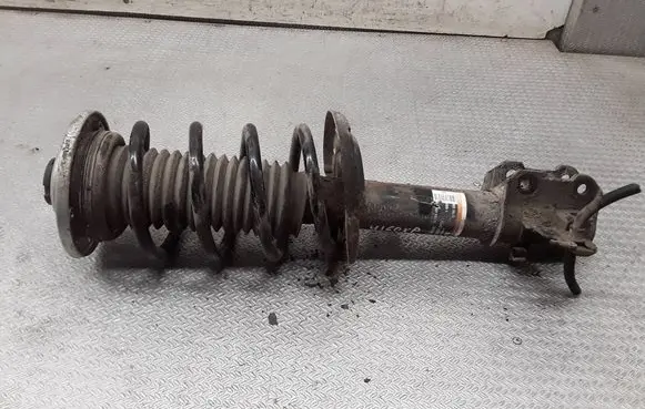 Cadillac BLS Front shock absorber with coil spring