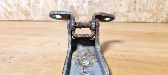 Front door lower hinge