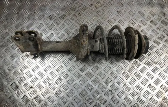 Subaru Outback Front shock absorber with coil spring