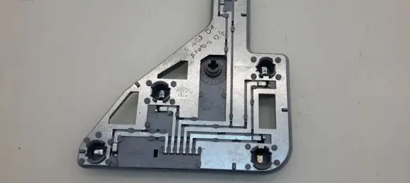 Tail light bulb cover holder