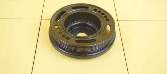 Opel Corsa D Timing belt tensioner pulley 55559328 25SP3