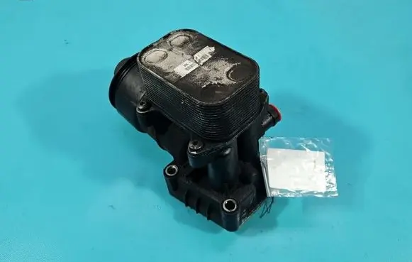 Volkswagen Caddy Oil filter mounting bracket 03L115389C IMPRK1592016