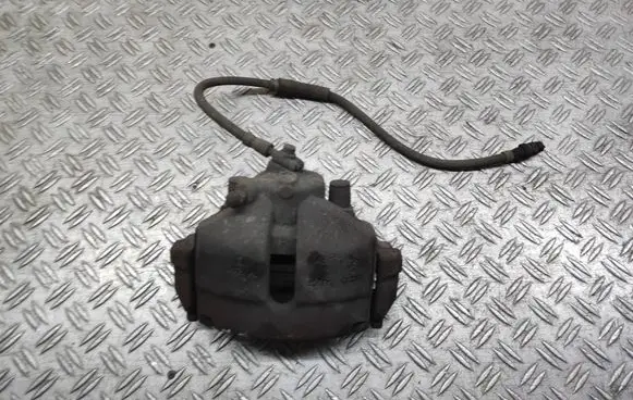 Volkswagen PASSAT B7 Front brake caliper 582VL