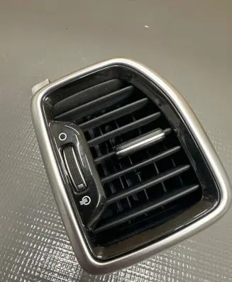 KIA Sportage Dash center air vent grill 97480