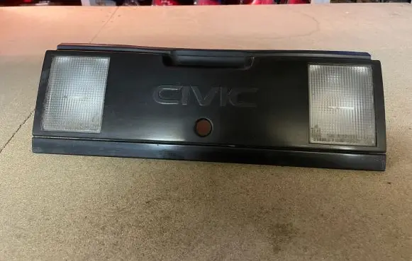 Honda Civic III Trunk door license plate light bar 0163652