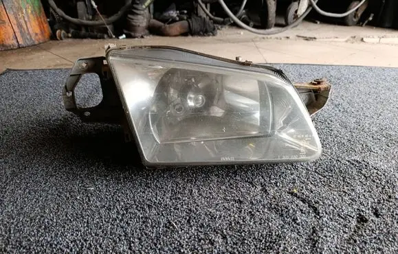 Mazda 323 F Headlight/headlamp 1305235393