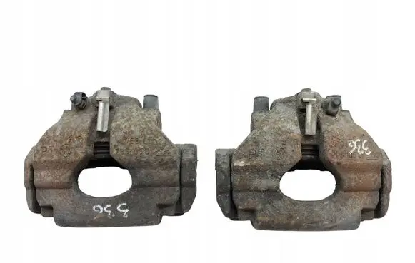 Volkswagen Touareg I Front brake caliper 