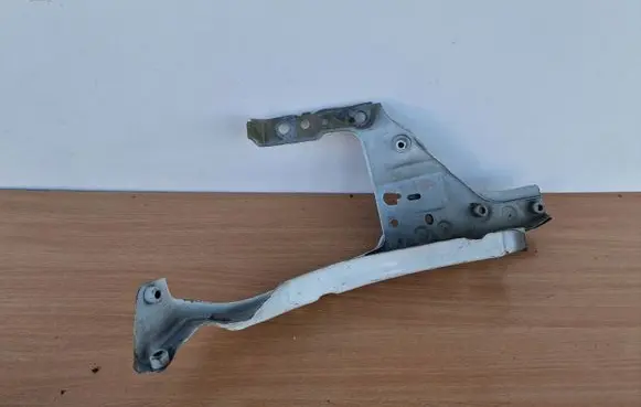Opel Astra H Headlight/headlamp mounting bracket 13237139