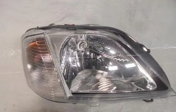 Renault Logan I Headlight/headlamp 