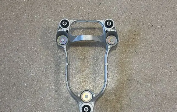 Hyundai Ioniq 5 A/C compressor mount bracket 97703GI000