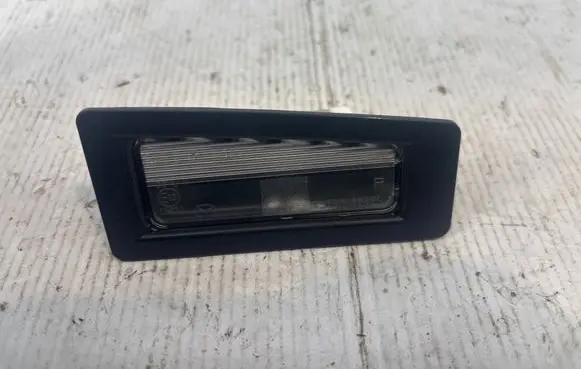 Mazda 3 III Number plate light 13041979