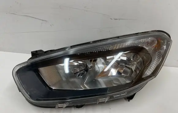 Ford Transit Courier Headlight/headlamp ET7613W030CK