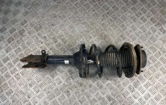 Subaru Outback Front shock absorber with coil spring