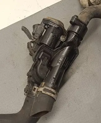 Thermostat/thermostat housing