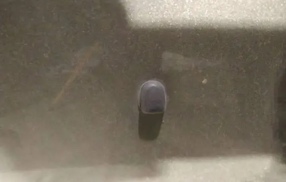 Windshield washer spray nozzle
