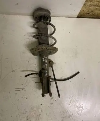 Nissan Juke I F15 Front shock absorber/damper 0KK1151